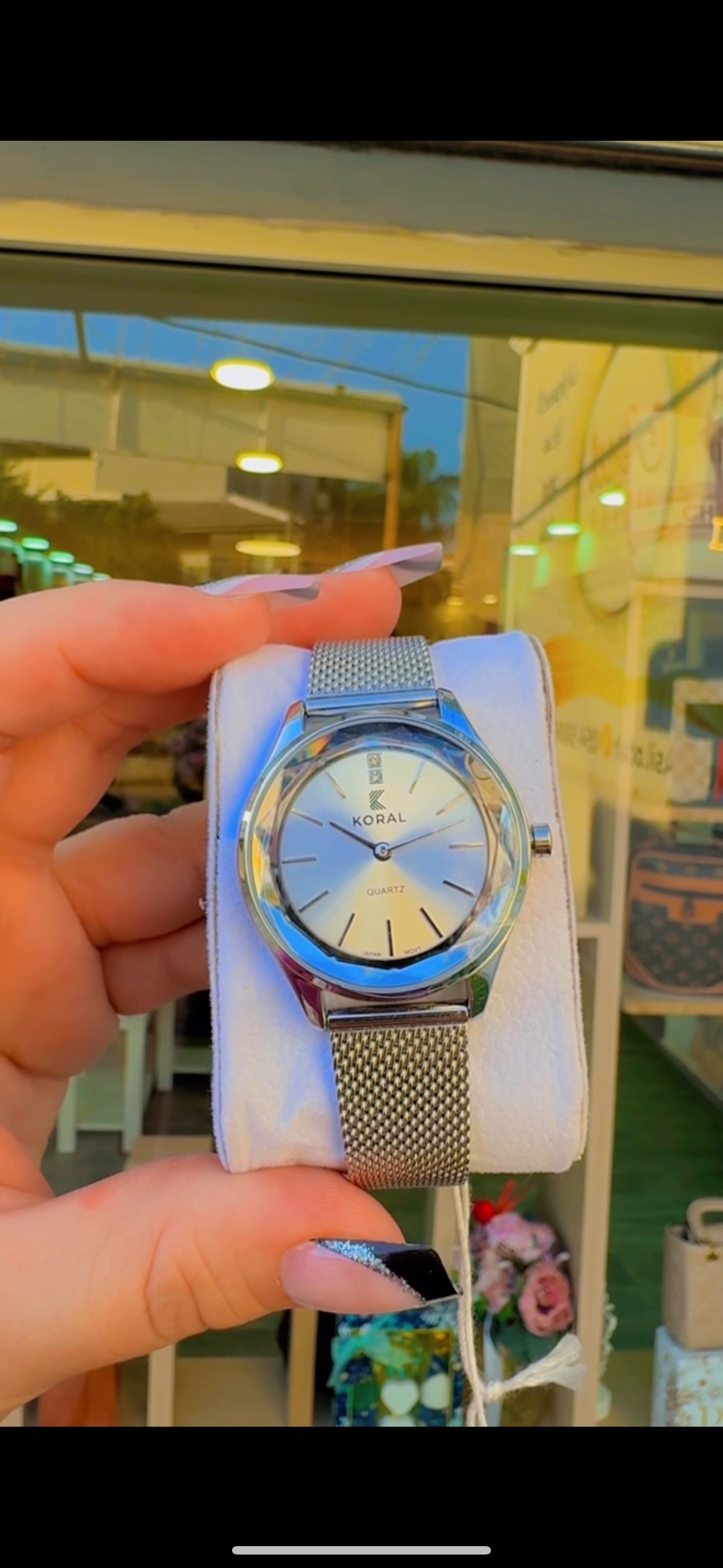 ساعة كورال فضيه