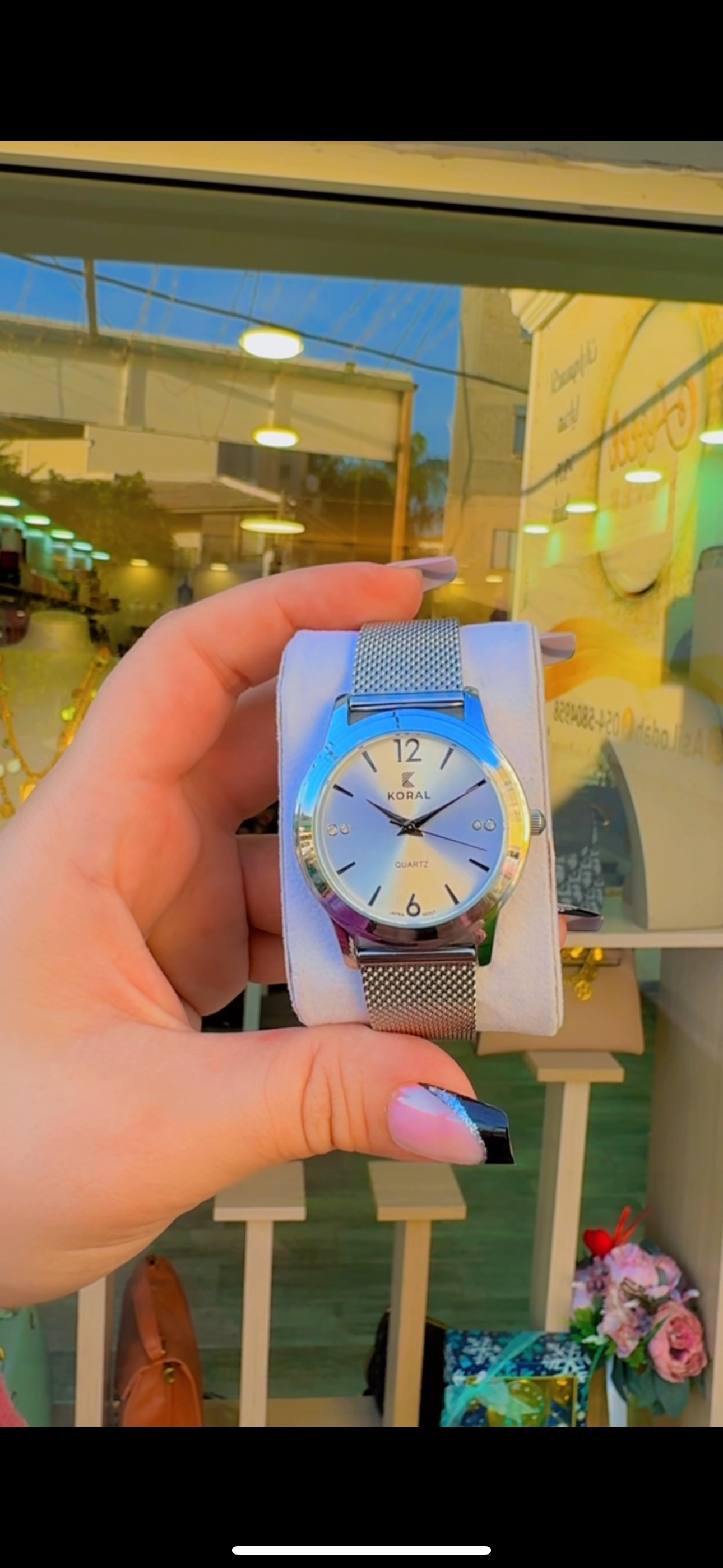 ساعه كورال فضيه