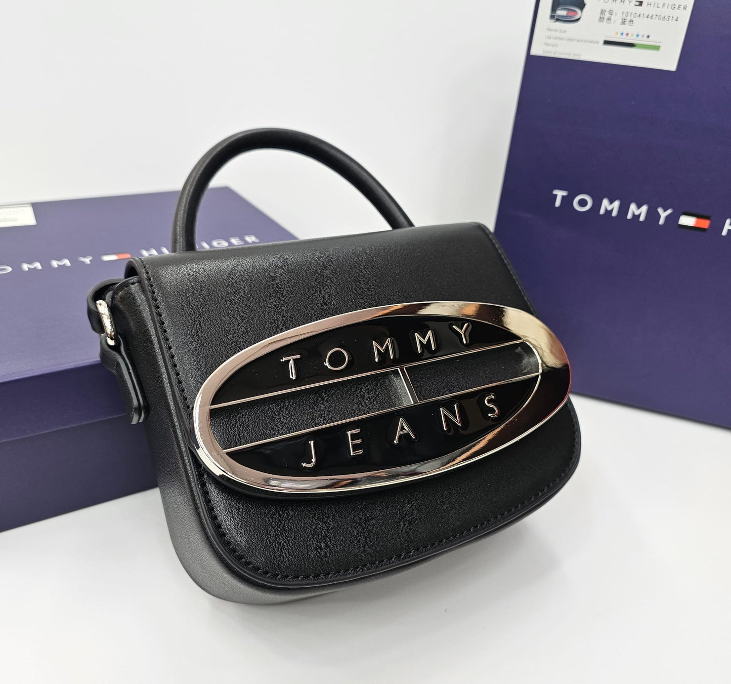 شنطه تومي اسود